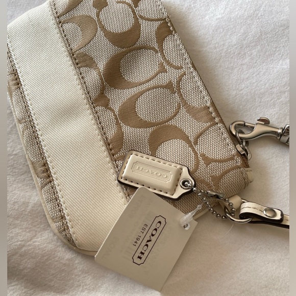 Coach Handbags - Coach F45608 Light Khaki/White wristlet NEW!